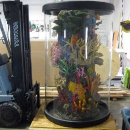672 gallon acrylic cylinder tank. New price 1000 less - $3900 (Okauchee, WI)
